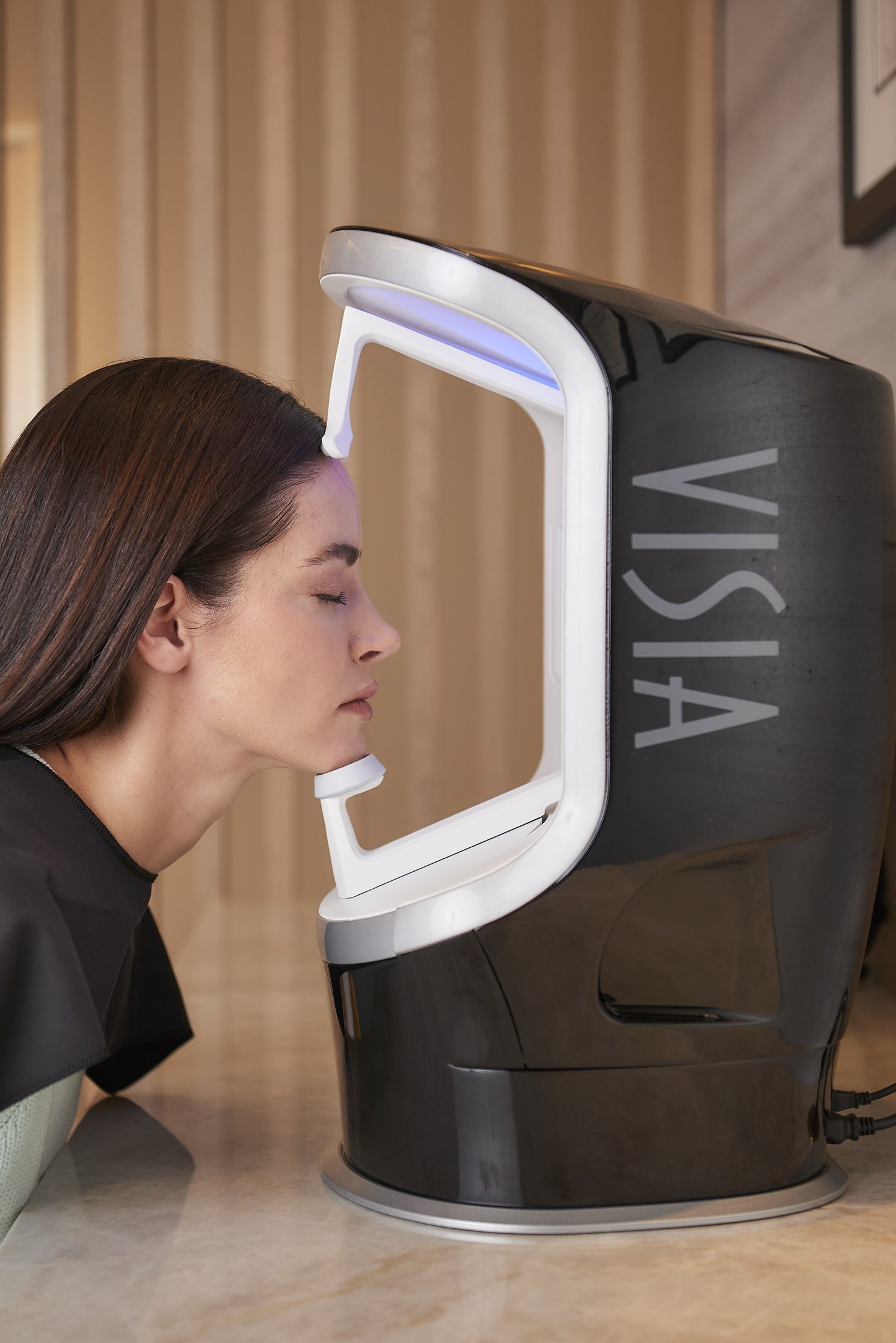 Patient using the VISIA skin analysis system